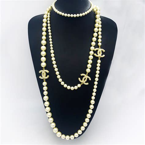 chanel crystal cc necklace replica|chanel pearl necklace price list.